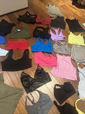 Set of 38 tank tops and sports bras. Various brands, various sizes.